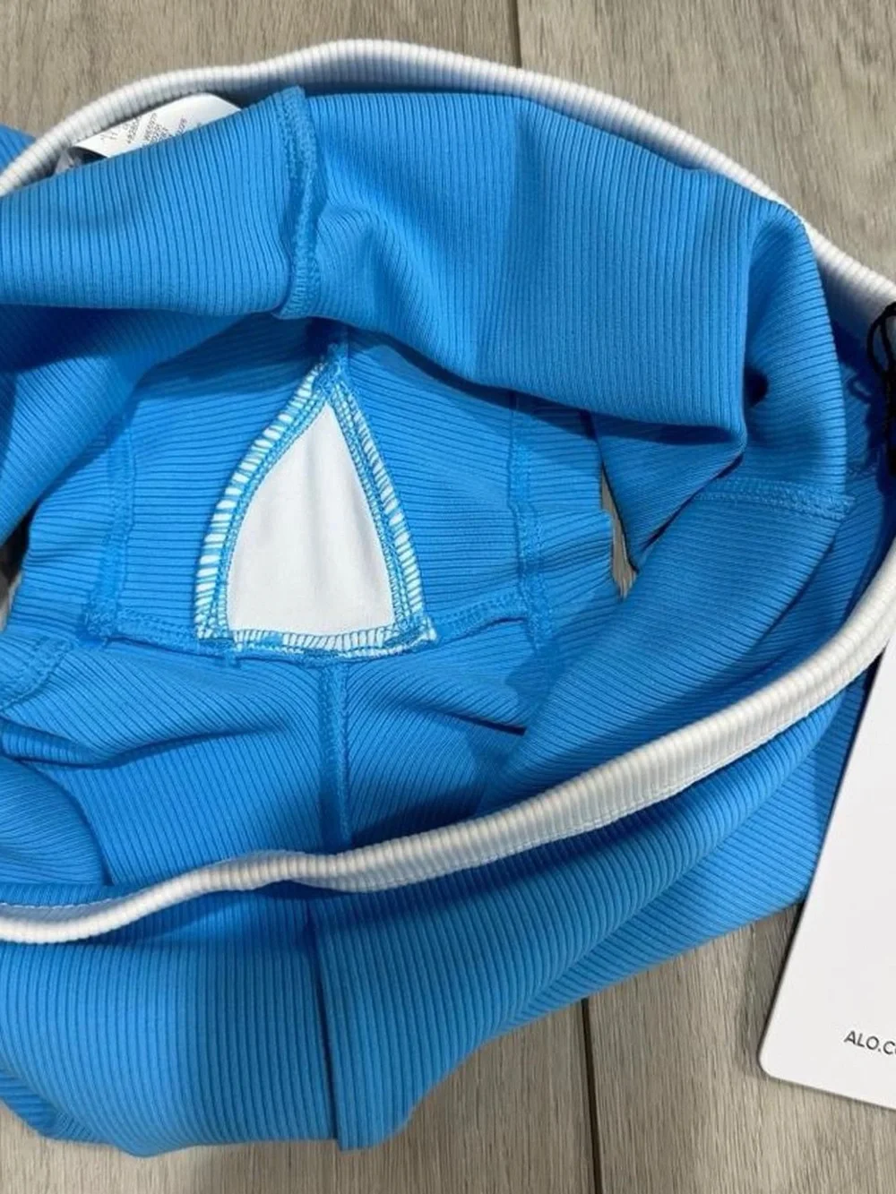 ALO Yoga Ribbed High-Rise Bike Shorts in Bright Blue with White Waistband